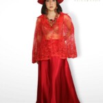 CONJUNTO ROJO FALDA CON CAPA DISEÑO EN TRANSPARENCIA